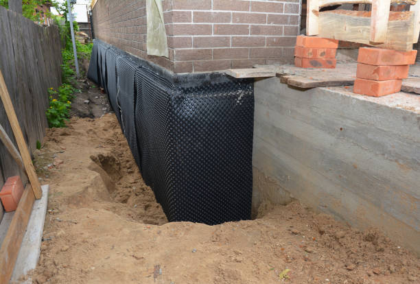 Happy homeowners after waterproofing job in Hurricane Mills